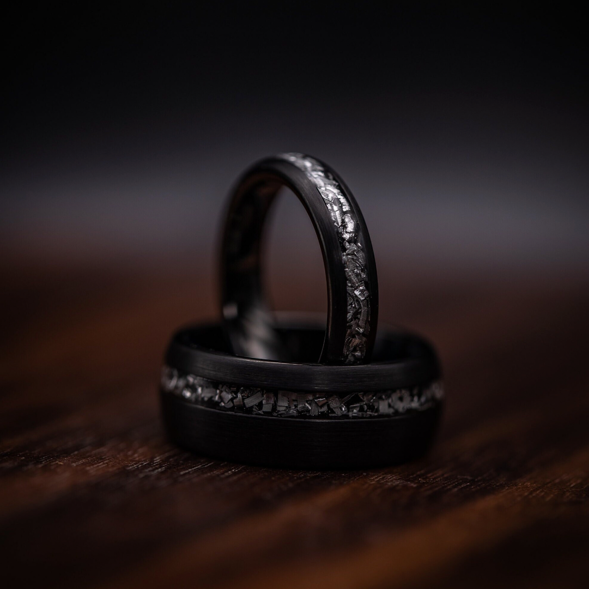 Stylish black brushed meteorite rings for couples