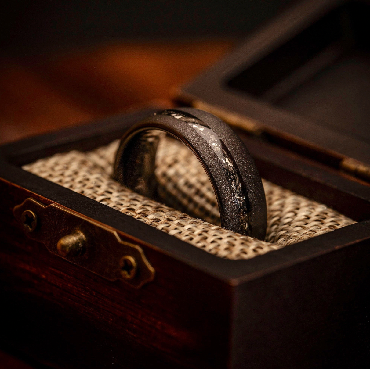 Men's black meteorite ring with sandblasted finish, a sleek and modern choice.