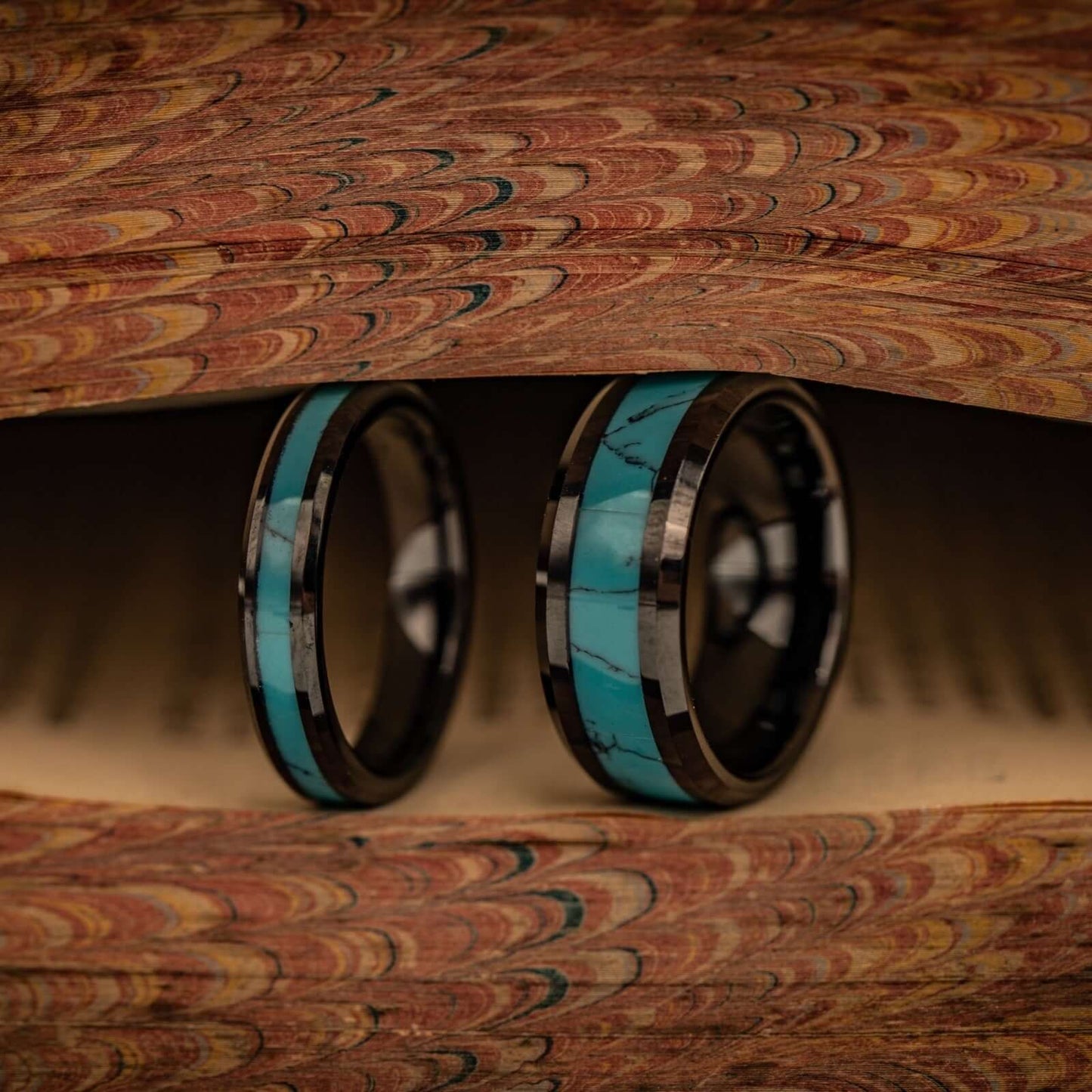 Stylish wedding band featuring turquoise and black accents, perfect for couples.