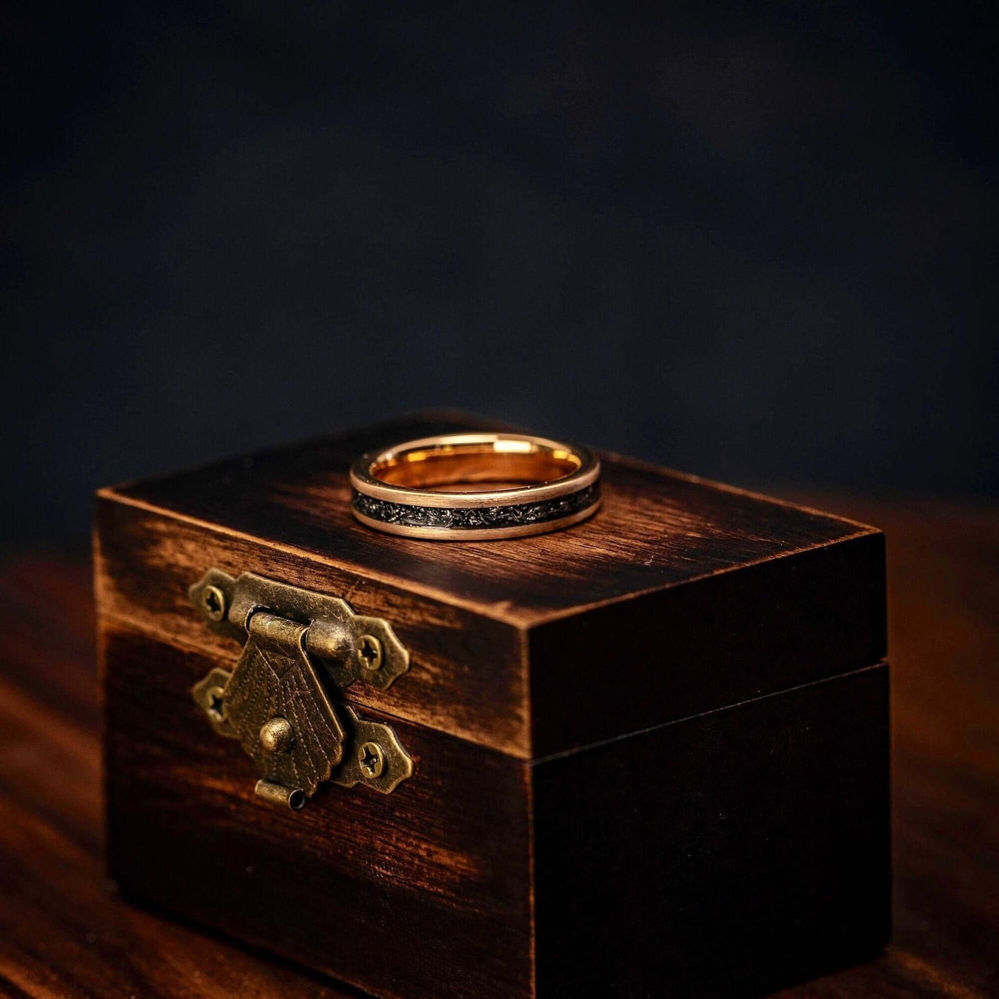 His and hers wedding bands crafted with exquisite meteorite and rose gold detailing.