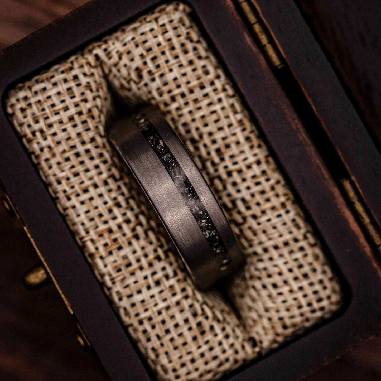 Stylish men's tungsten band with genuine meteorite accents, ideal for special occasions.