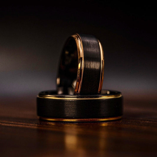 Sleek black and rose gold edge ring, crafted from brushed tungsten for a modern look.