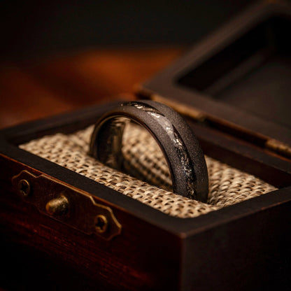 Striking black meteorite wedding ring set, perfect for celebrating everlasting love.