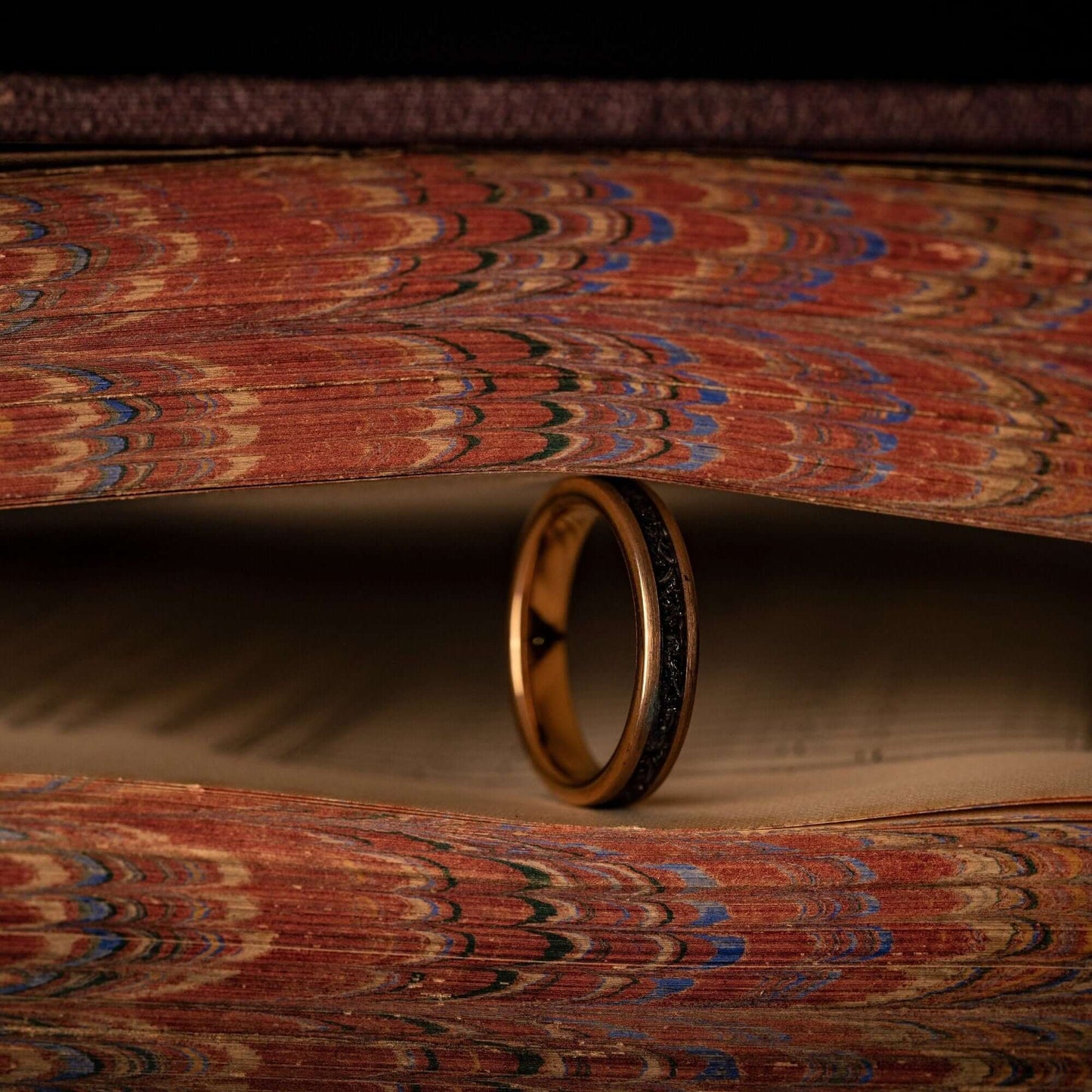 His and hers wedding bands crafted with rose gold and authentic meteorite.
