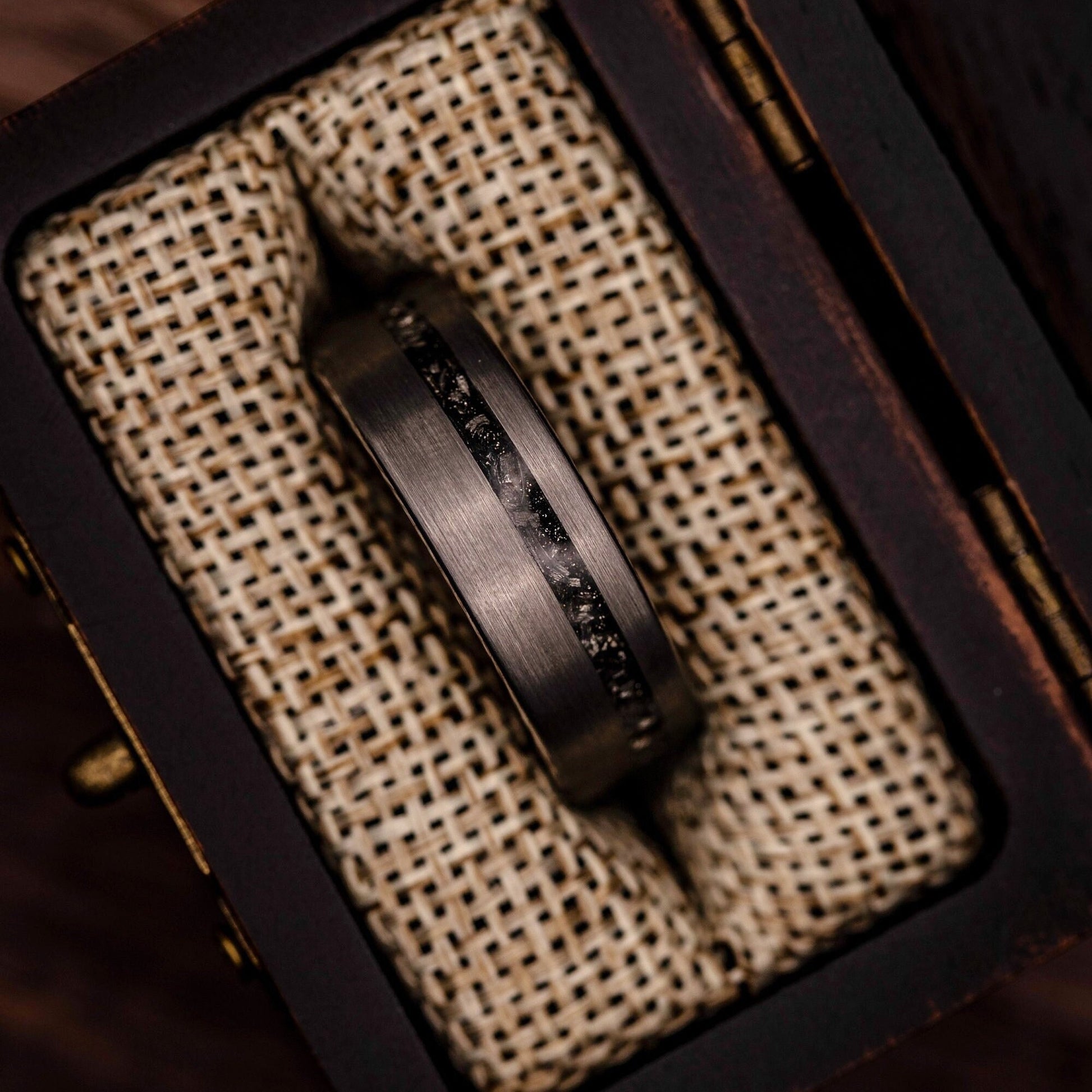 Men's 8mm Silver Tungsten wedding ring with meteorite inlay inside walnut ring box