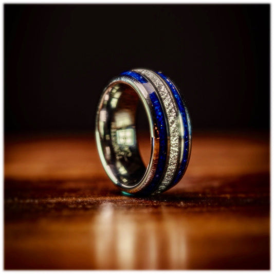 Unique men's wedding band featuring silver and blue lapis lazuli with genuine meteorite.