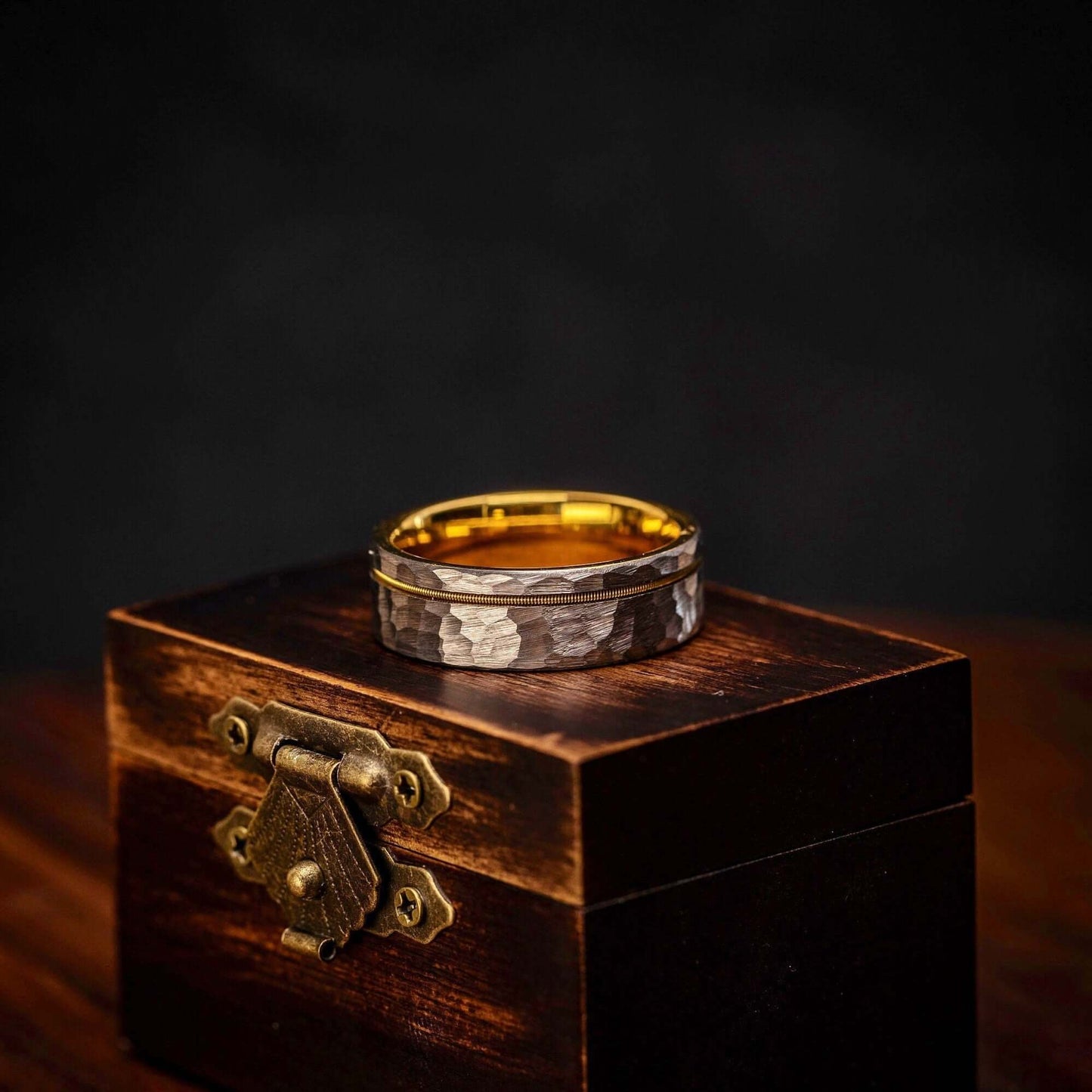 Unique silver and gold ring for men, showcasing a blend of modernity and tradition.