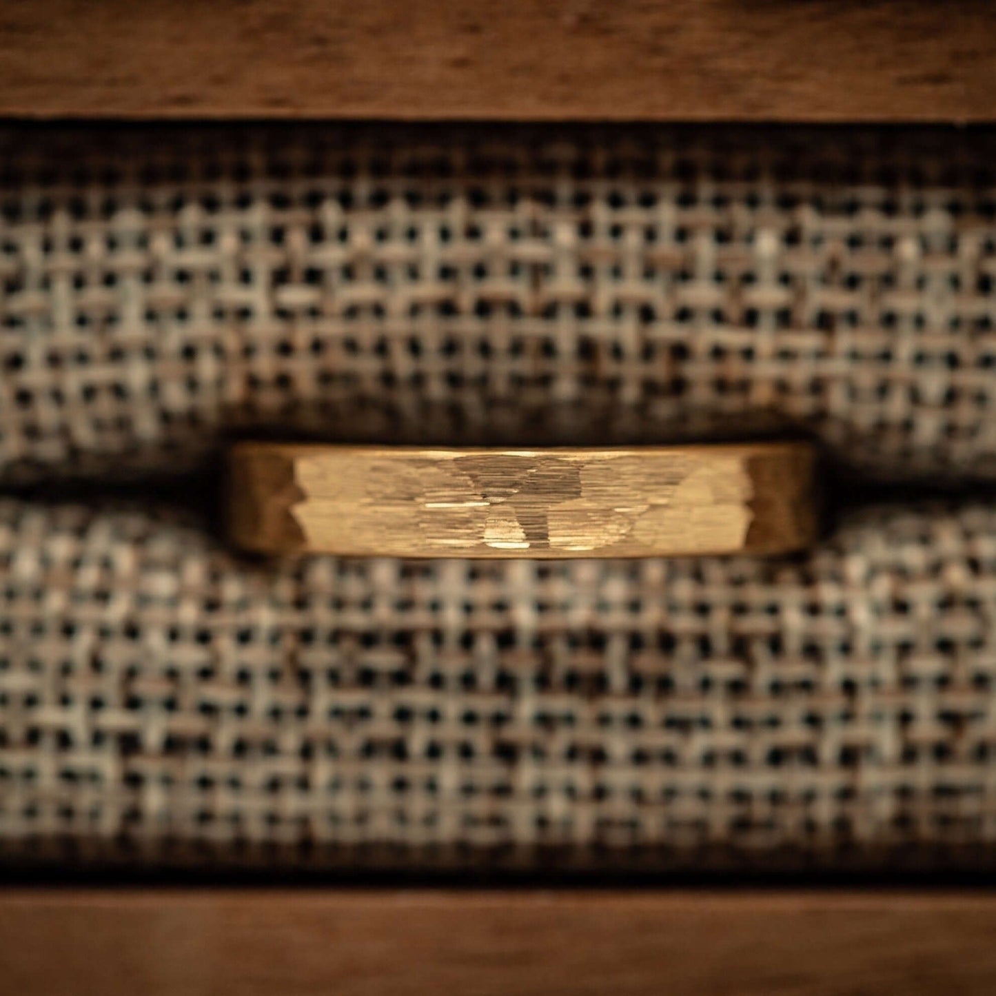 Women's 4mm Hammered Yellow Gold Tungsten Wedding Ring in walnut ring box with burlap cushions