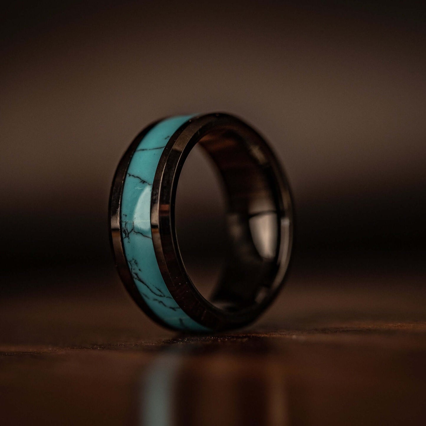 Turquoise wedding ring standing on its side