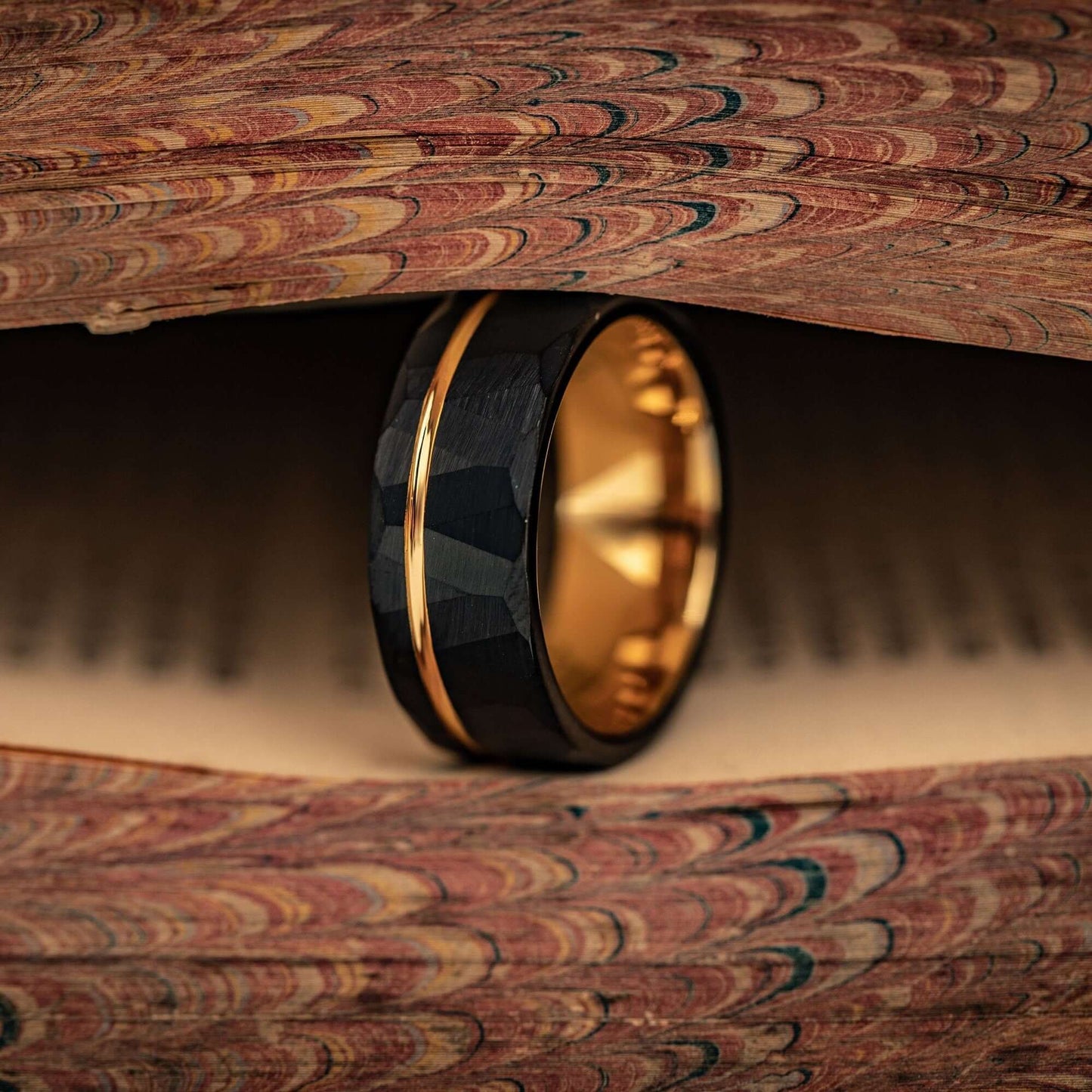 Hammered Black Tungsten Wedding Ring with Polished Rose Gold Inner Band