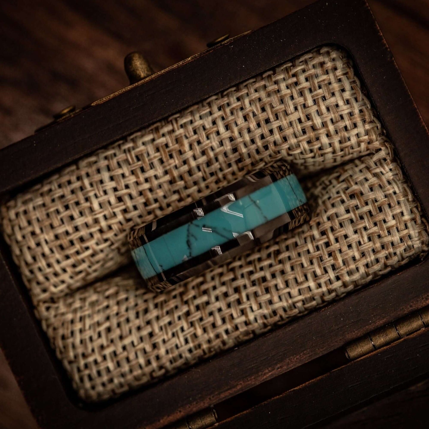Turquoise wedding Band with Black band inside ring box