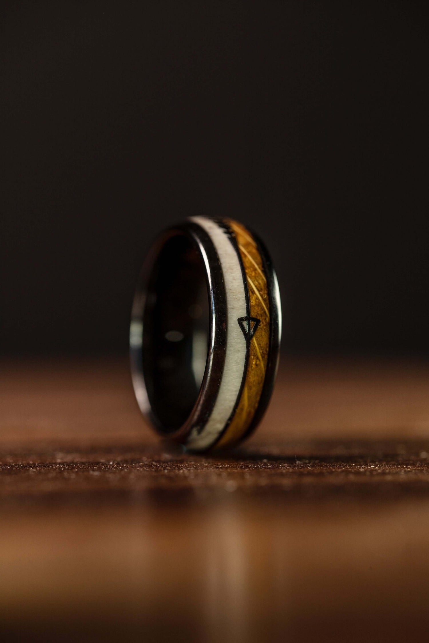 Handcrafted antler ring with gold and meteorite inlay, perfect for weddings or everyday style. Unique design, free standard shipping.