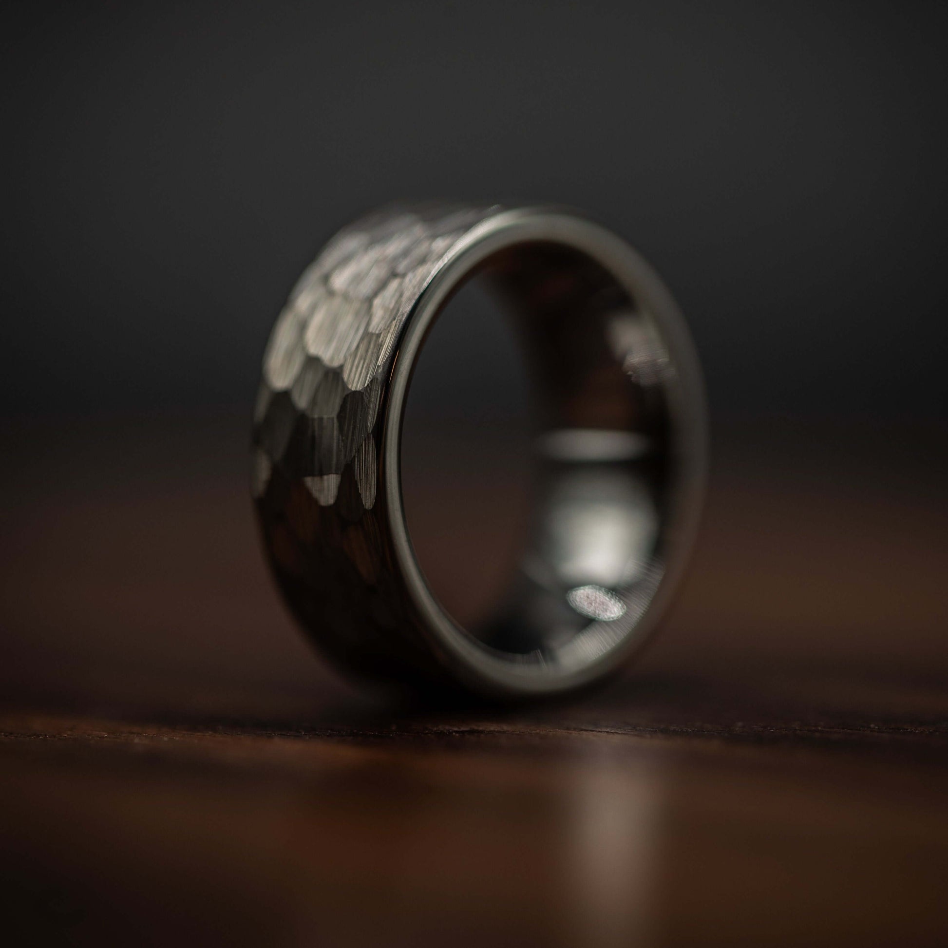 Hammered silver tungsten wedding band, showcasing a rustic and bold design, perfect for men's engagement or wedding rings.