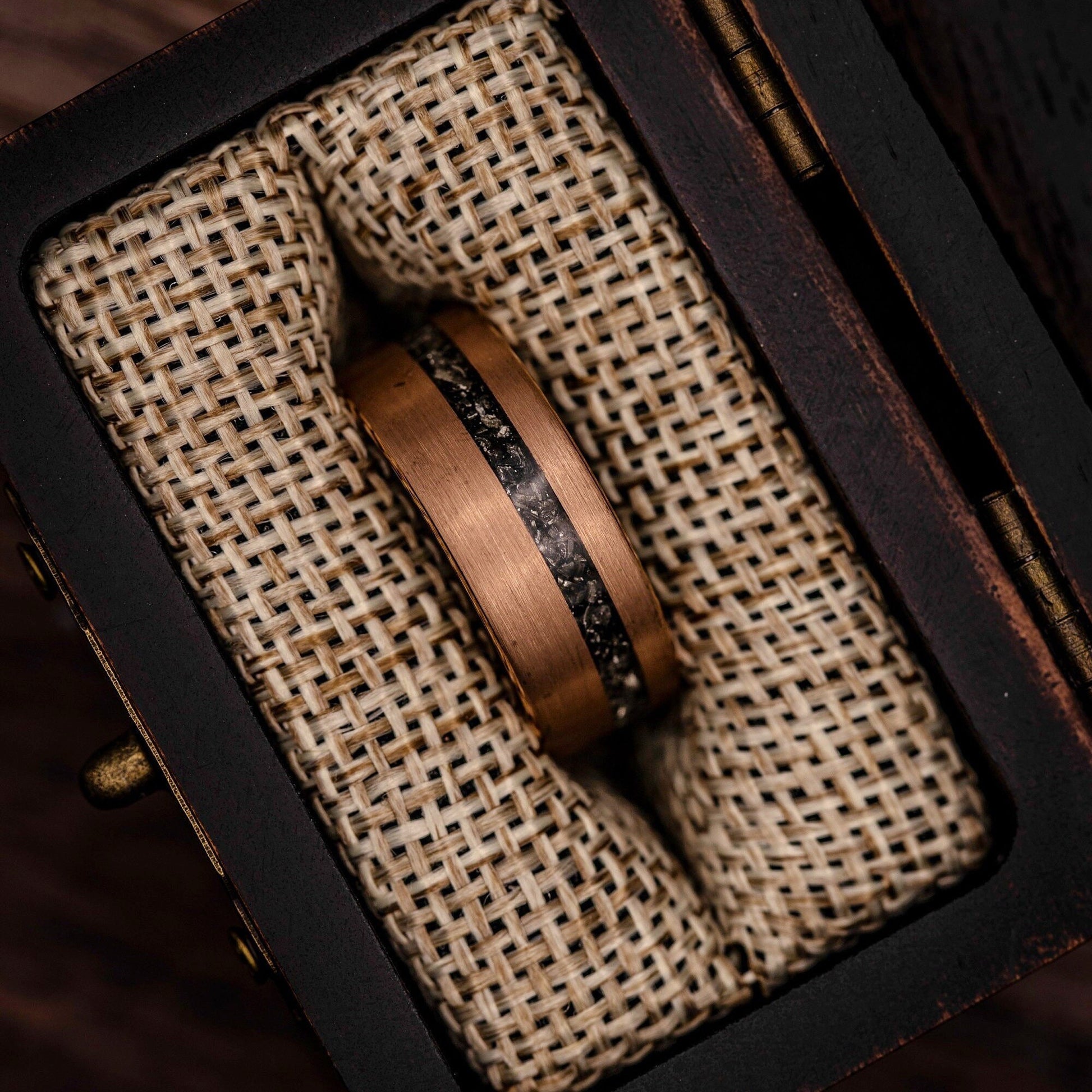 Rose gold and meteorite wedding bands, a perfect symbol of unity for couples.