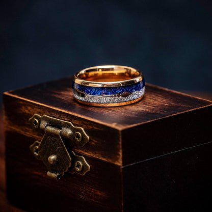 Striking men's wedding ring with rose gold, lapis lazuli, and meteorite inlay.