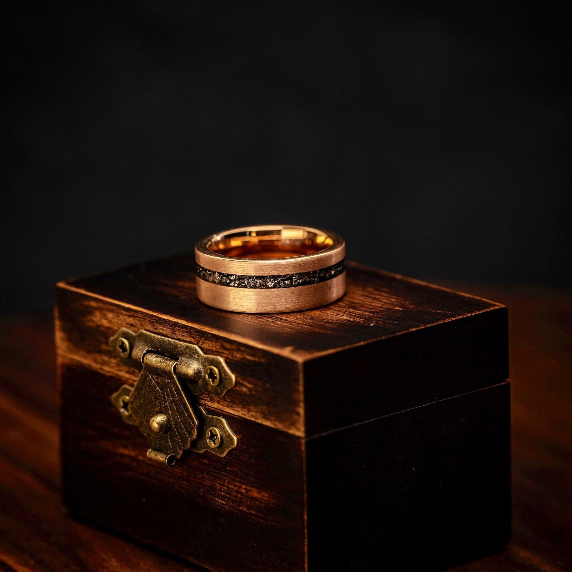Couples wedding ring set showcasing the beauty of real meteorite and rose gold.