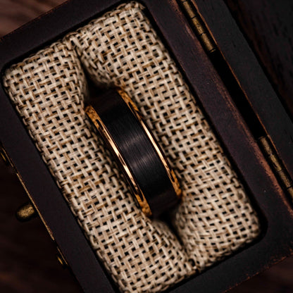 Sophisticated brushed tungsten ring with rose gold edges, ideal for a unique statement piece.