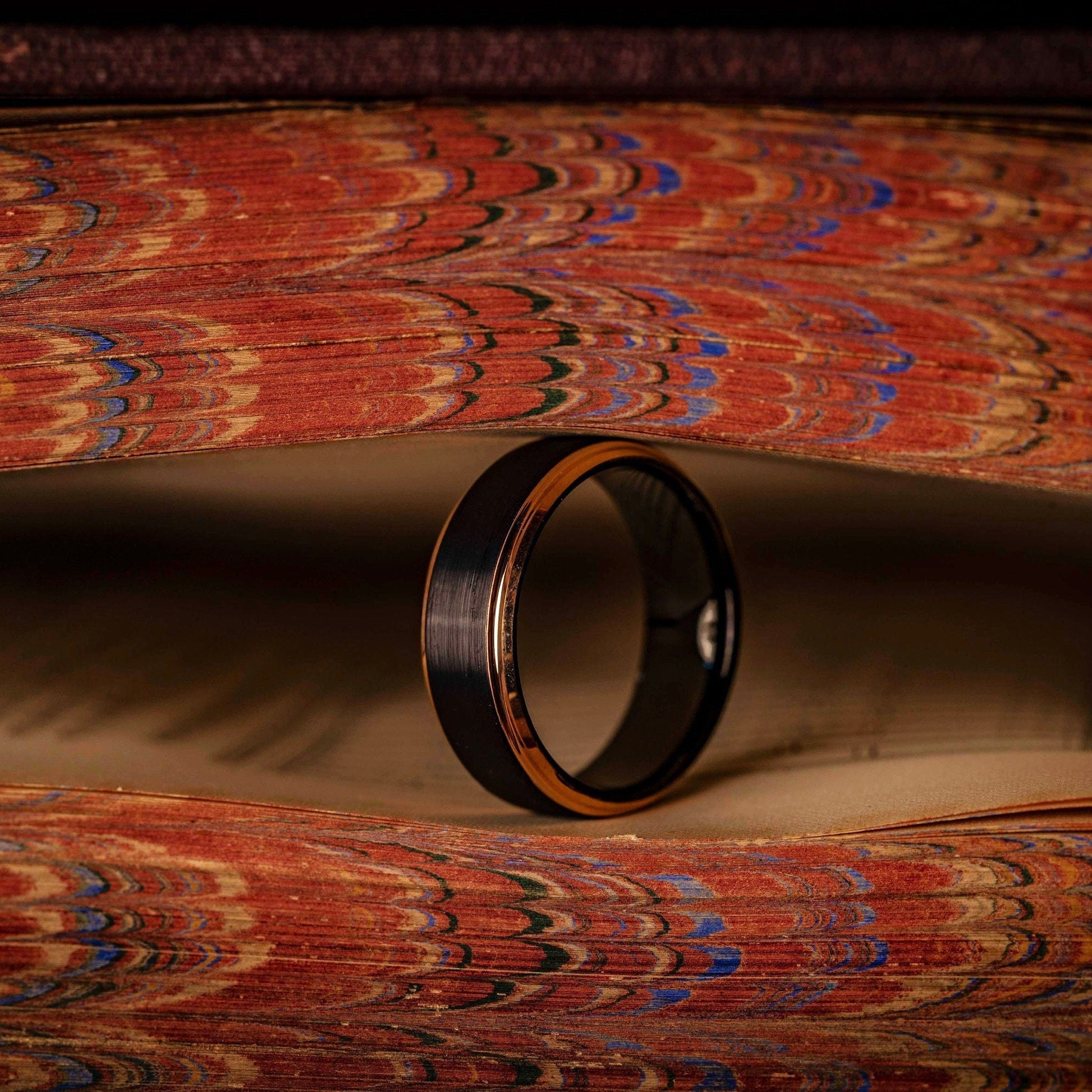 Elegant 8mm brushed tungsten ring with striking rose gold edges, perfect for special occasions.