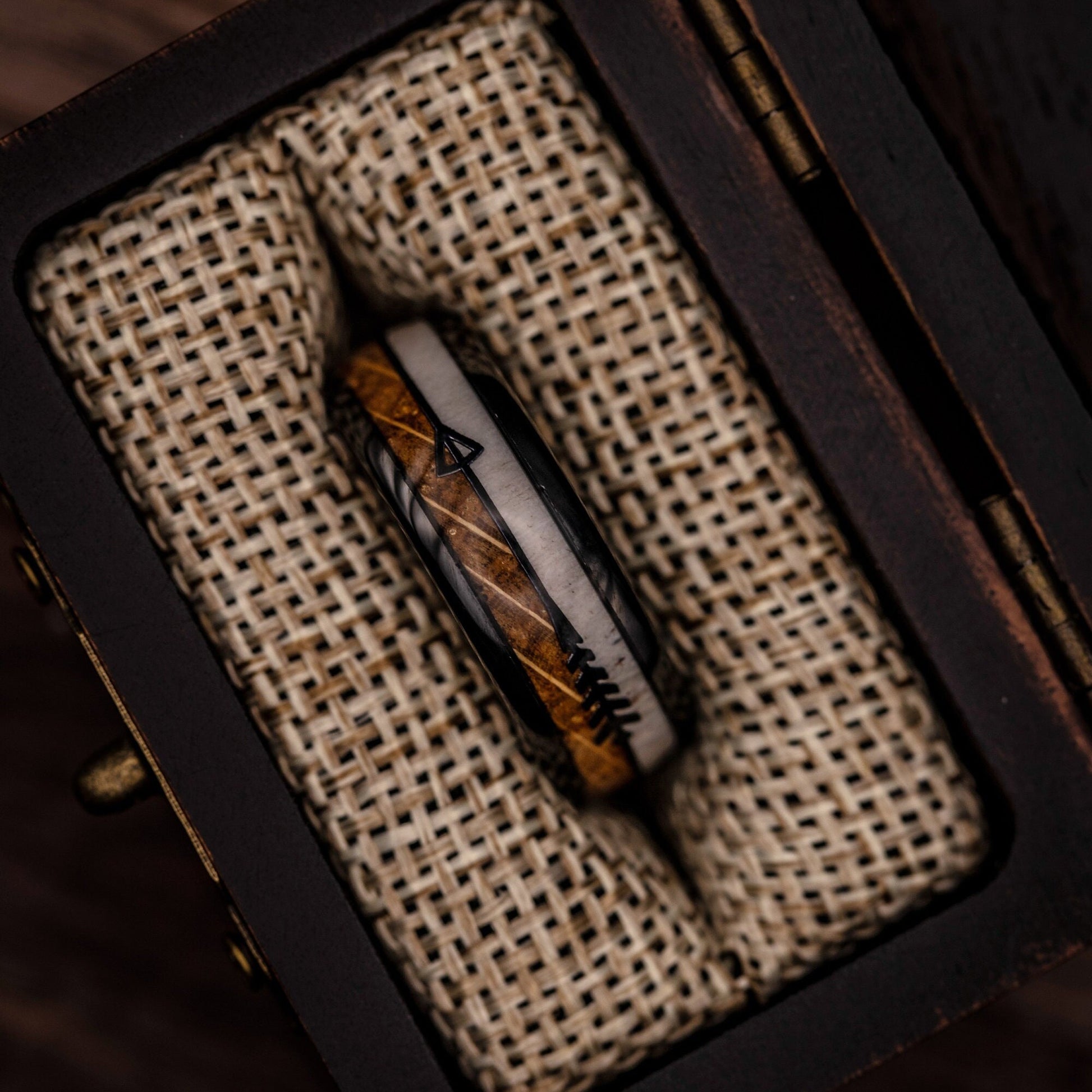 Handsome men's engagement ring with 8mm width, featuring deer antler and wood detailing.
