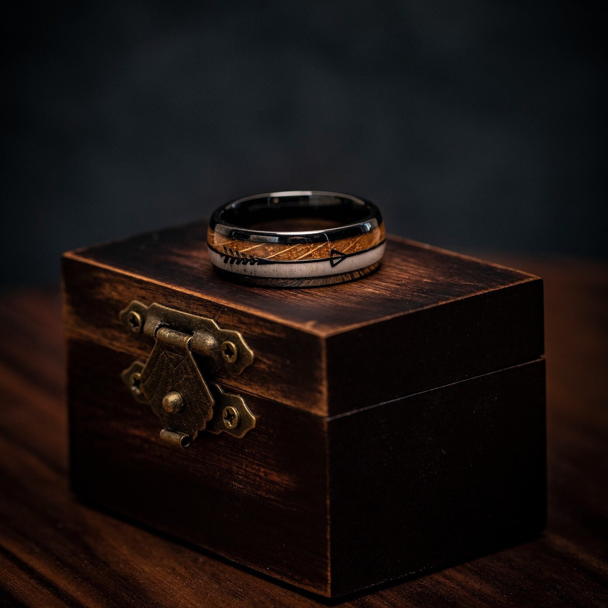 Elegant 8mm wedding ring with deer antler and wood inlay, ideal for engagements.